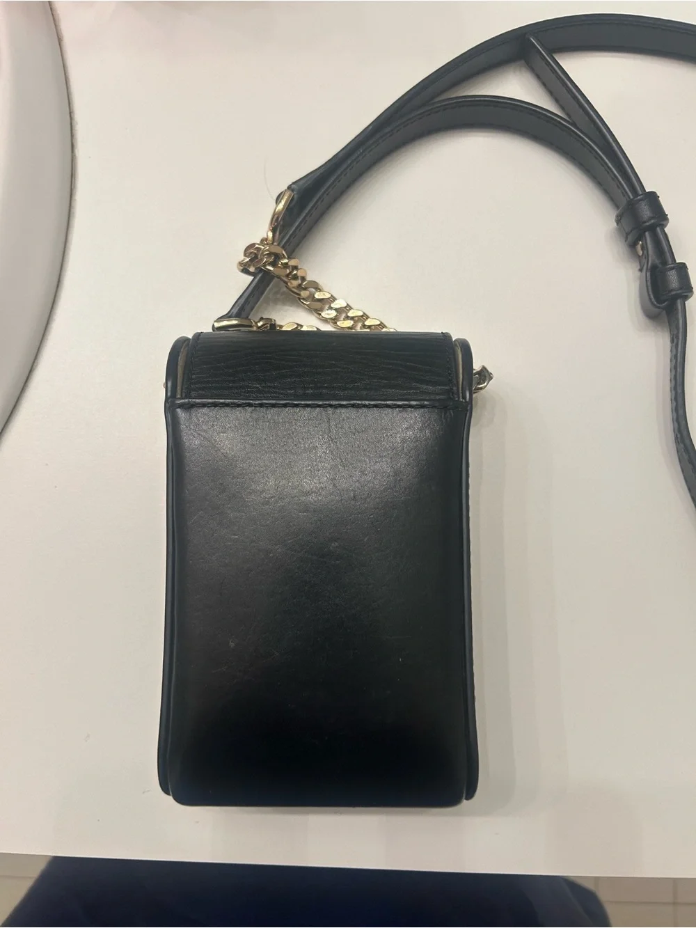 Michael Kors gold closure lock